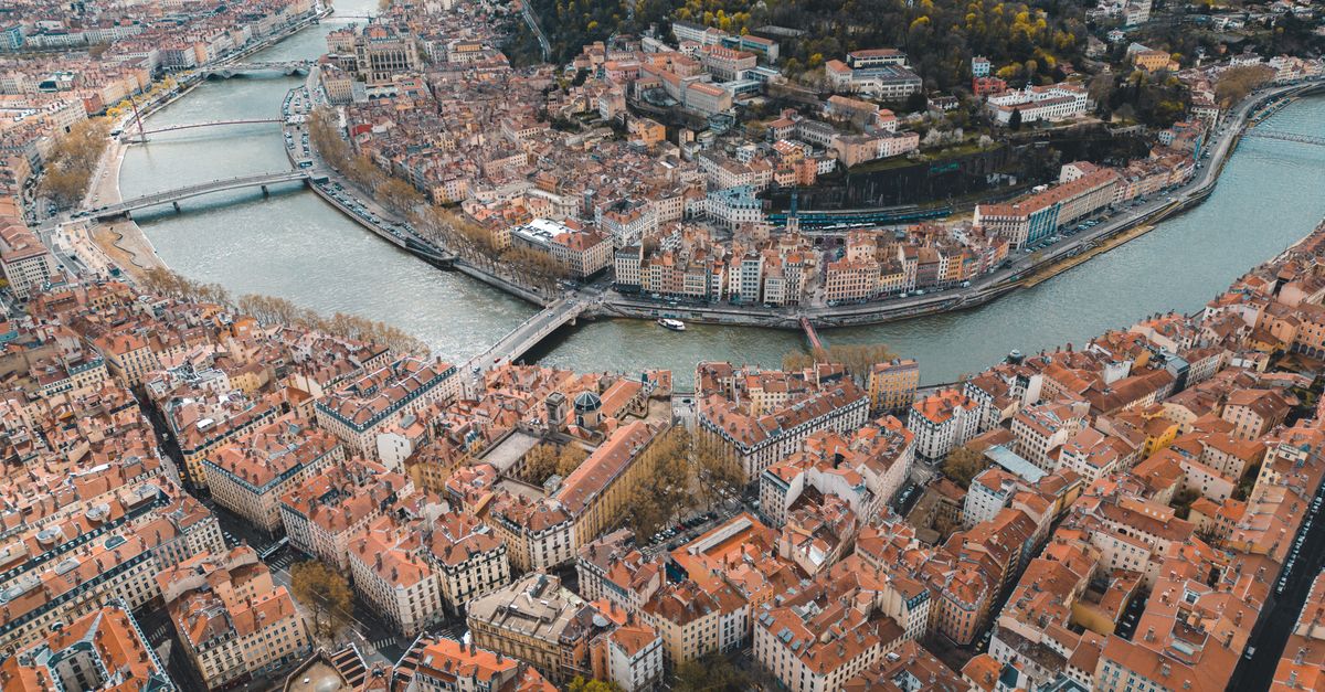 Stunning aerial shot capturing the rivers and historic architecture of Lyon, France.